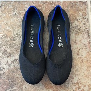 Solid black Rothy’s flats EUC